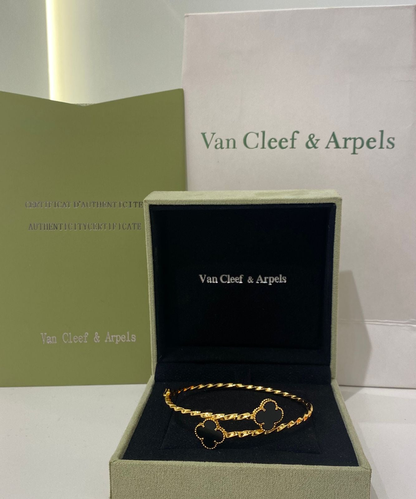 Van Cleef Triple Clover Bracelet