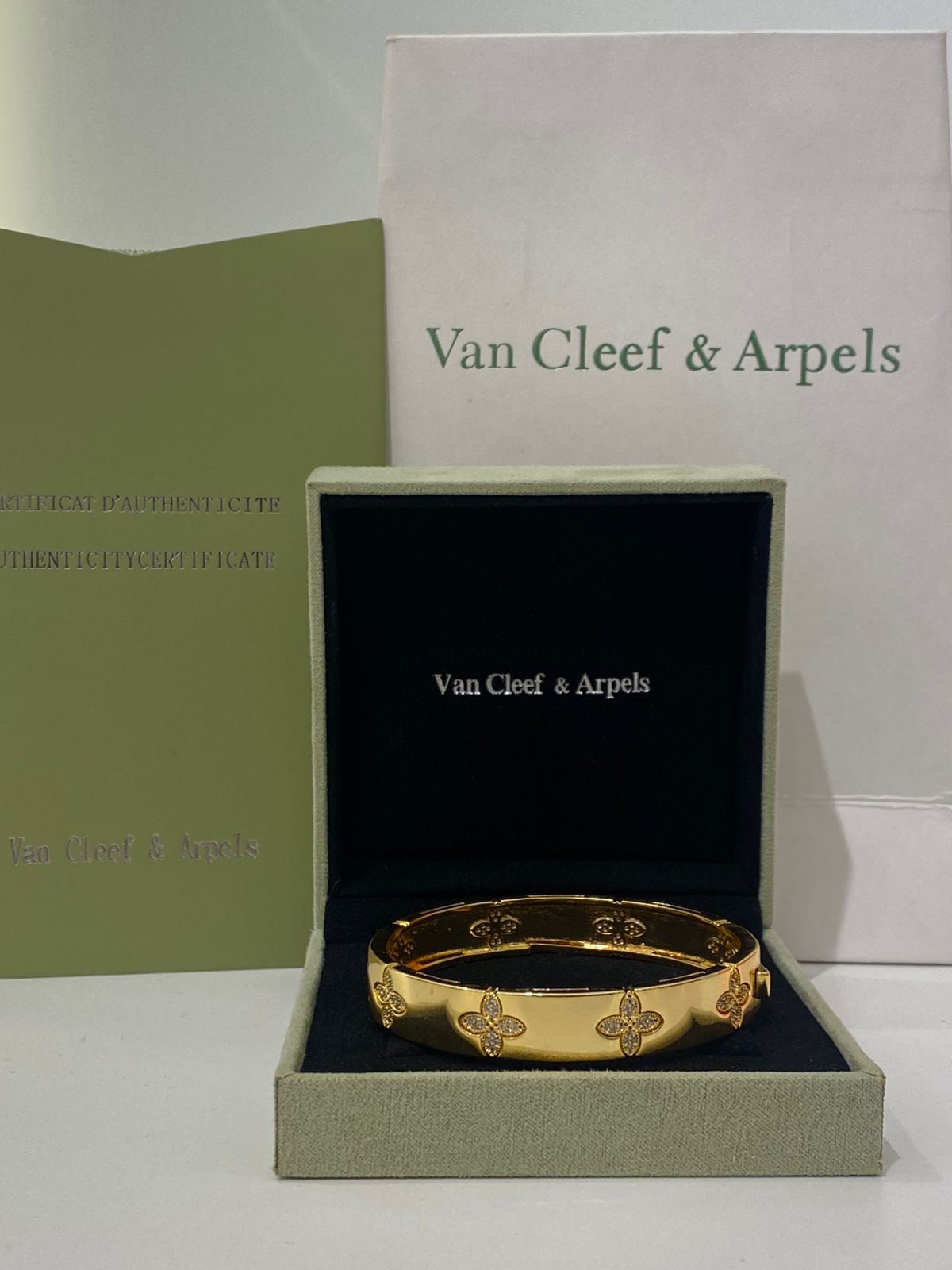 Van Cleef Patterned Gold Bangle Bracelet